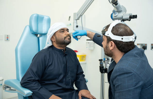 A patient undergoing a nasal examination by an experienced ENT specialist in Sharjah.