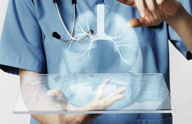 Pulmonary specialist examining a virtual lung image