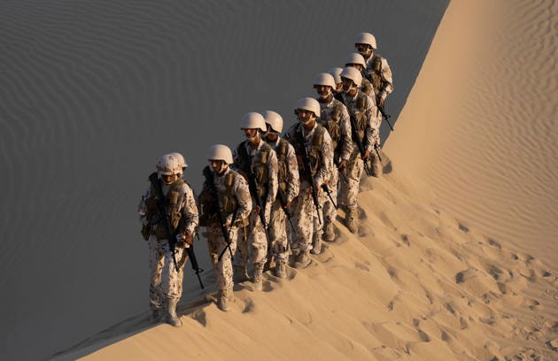 Military personnel participating in physical assessment during Medical Screening for National Service in Sharjah.
