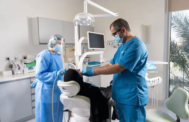 A patient receiving professional dental treatment from an experienced team at a Dental Hospital in Sharjah.