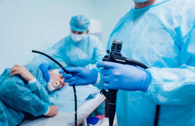 A medical team preparing to perform a gastrointestinal procedure at an Endoscopy Hospital in Sharjah.