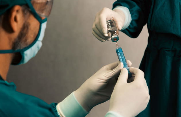 Surgeon Fill Syringe From Vial Surgical Procedure Sterile Operation Room