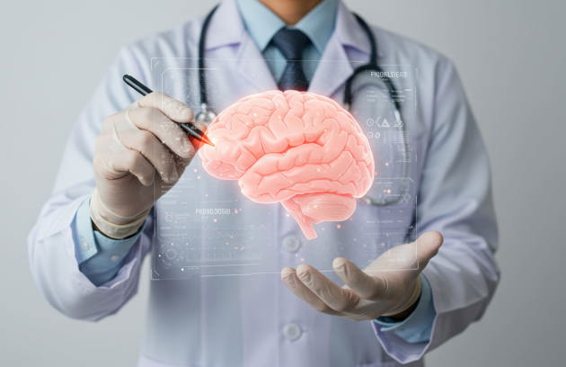 Doctor Examining Glowing 3D Brain Model Medical Visualization