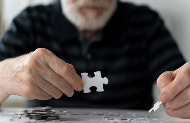 Elderly Man Confronting Alzheimer Disease